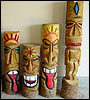 four custom made Tiki Poles depicting hawaiian gods